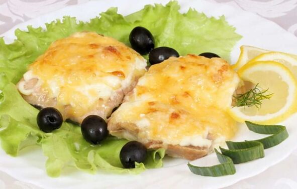Baked fish with cheese is a tasty and healthy dish on the menu of the Mediterranean diet. 